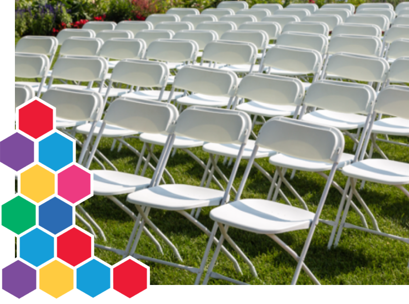 Clean white party chairs arranged by Busy Bee Jumpers for an outdoor event in Cape Cod