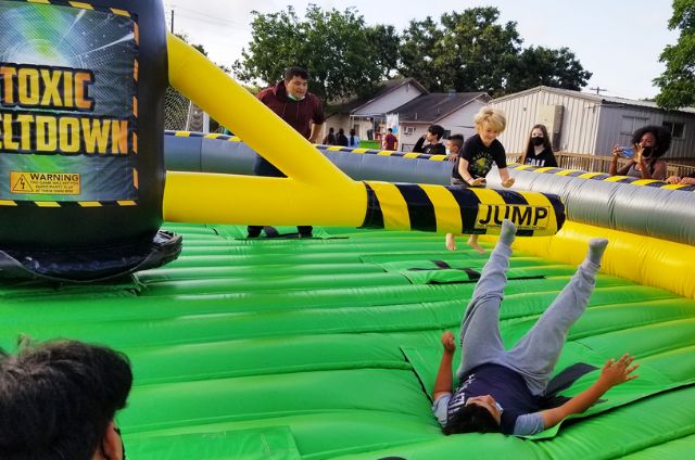 Kids enjoying outdoor party rentals at Central Texas celebration