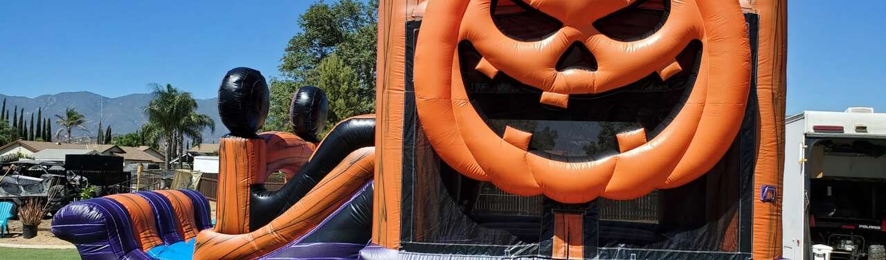 Pumpkin-themed Halloween bounce house rental Pumpkin-themed Halloween bounce house rental