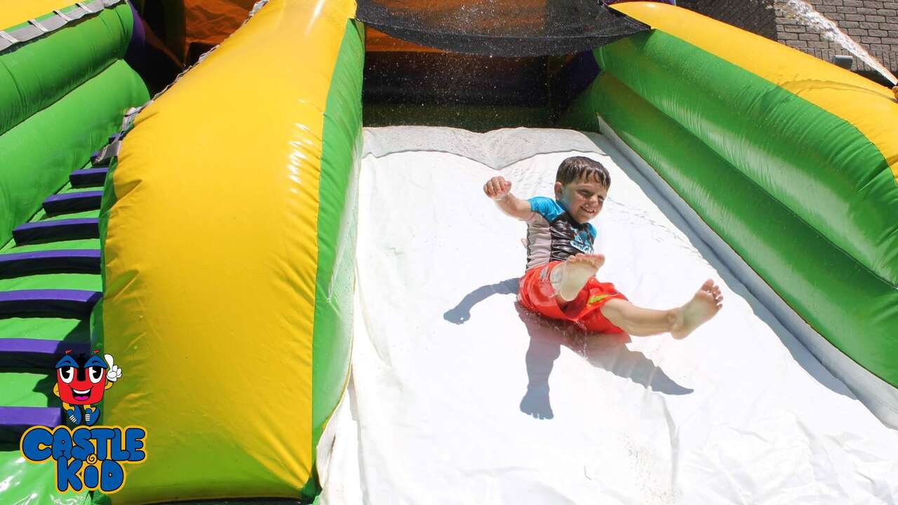 TSSA water slide rentals Brampton large inflatable water slide setup for festivals corporate events and school events Ontario compliant Castle Kid