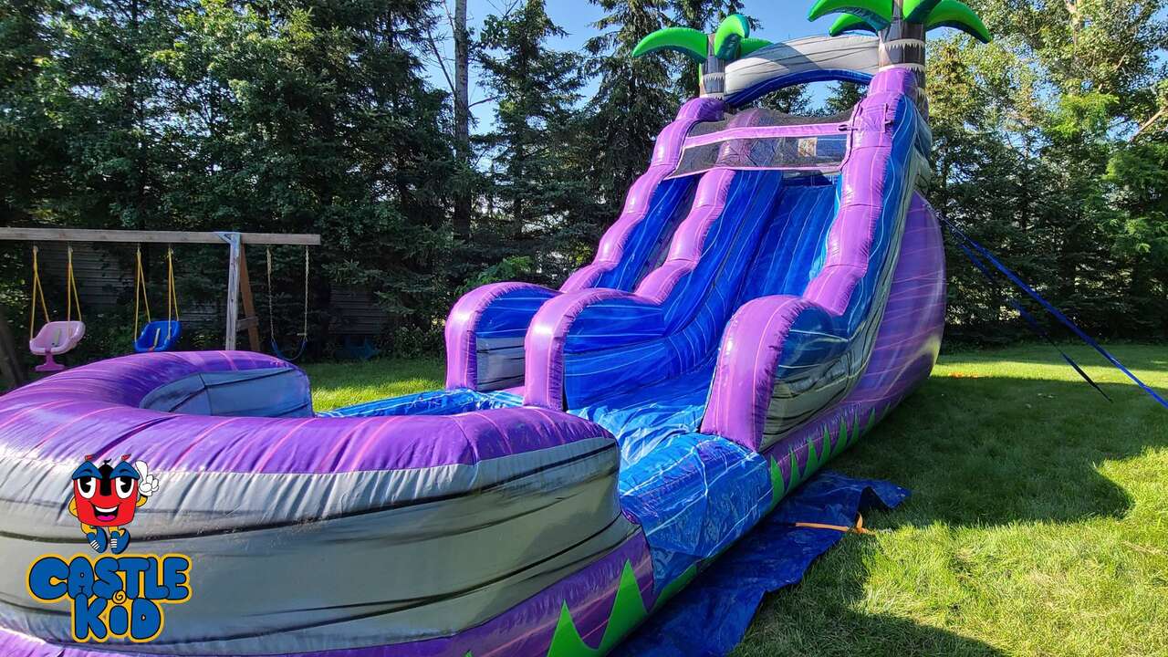 Purple Crush inflatable water slide rental backyard party Oshawa Castle Kid Jumping Castle Rentals