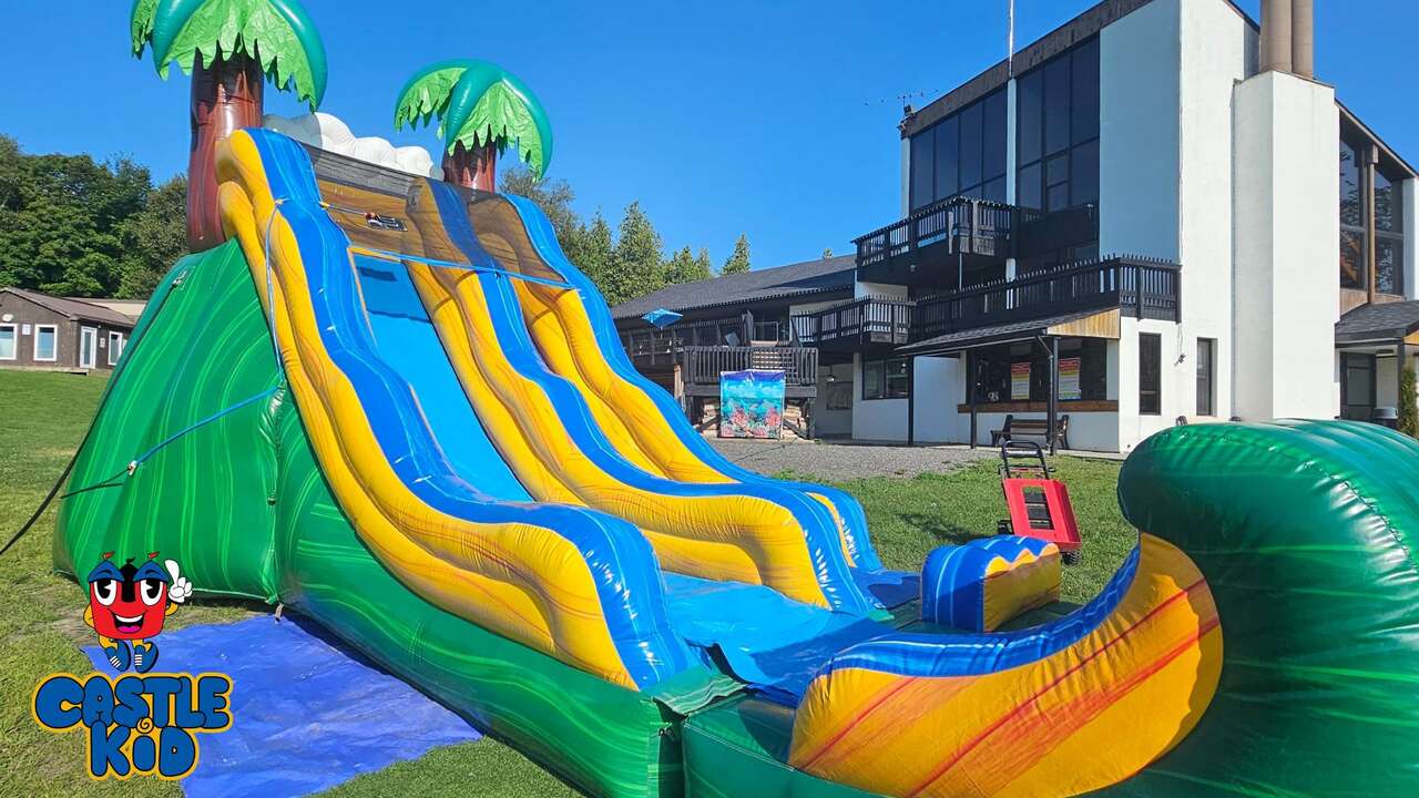 Tropical Wave inflatable water slide rental backyard party Oshawa Castle Kid Jumping Castle Rentals