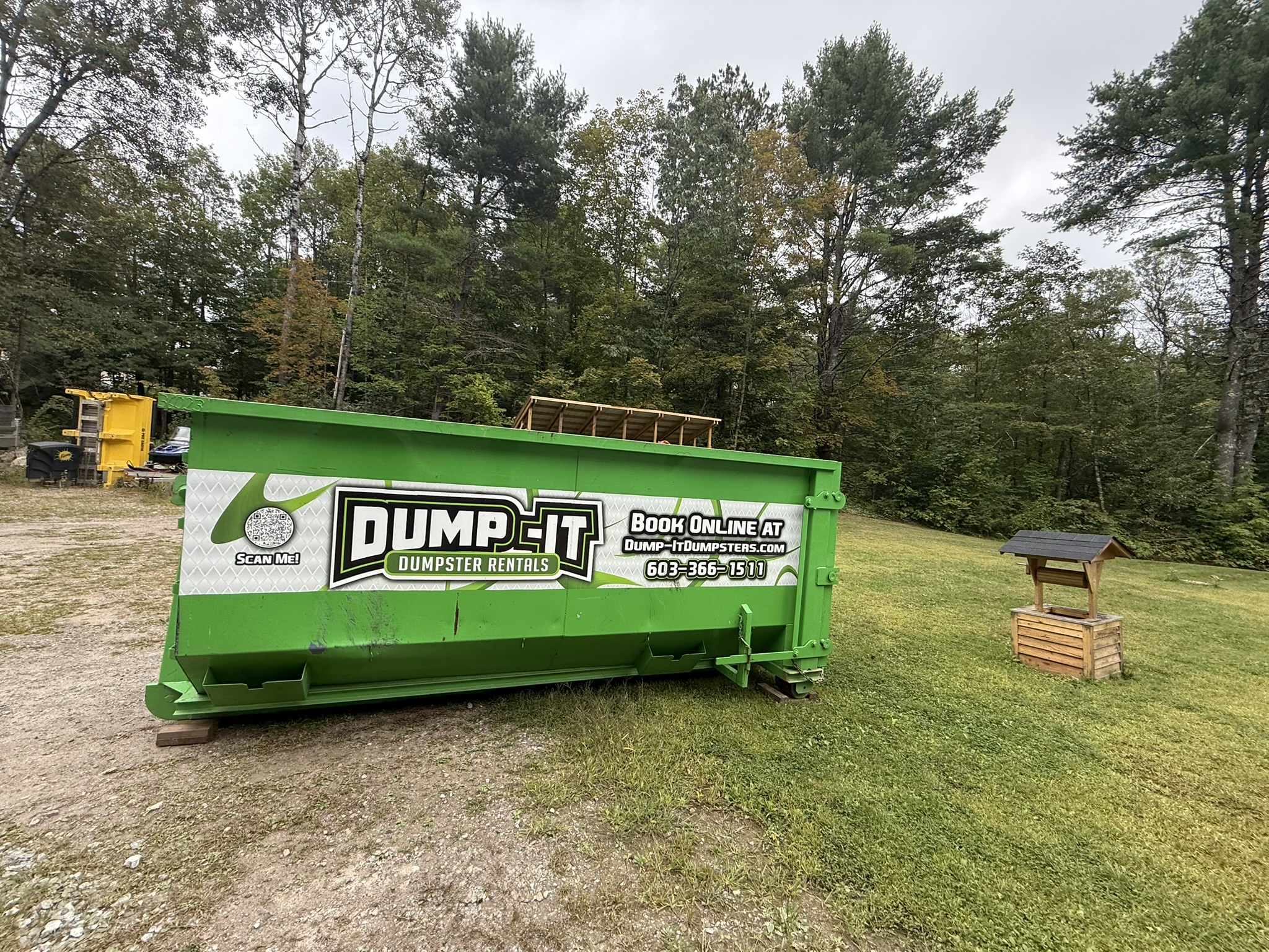 Two dumpsters from Dump-It Dumpster Rentals side by side