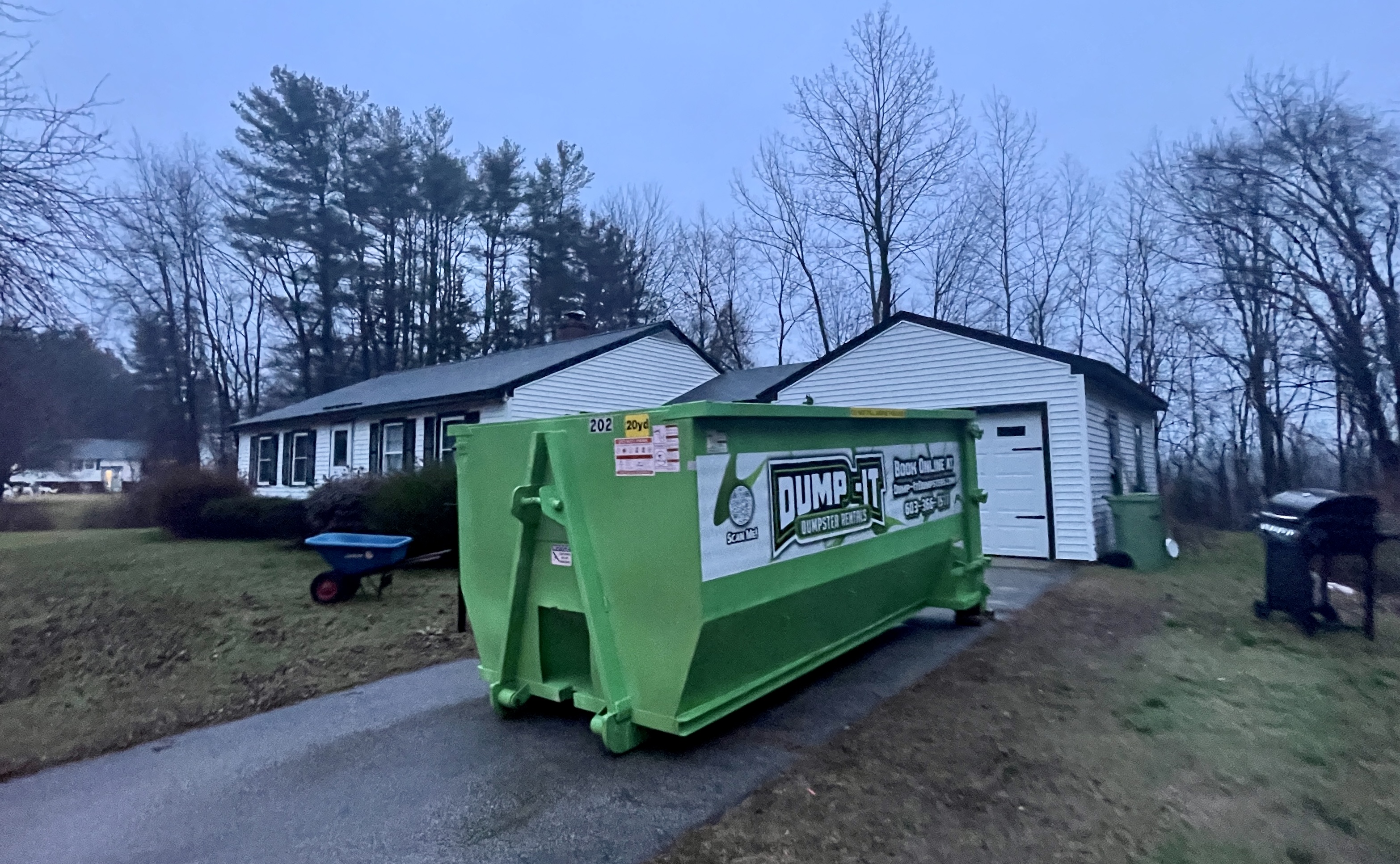 Two dumpsters from Dump-It Dumpster Rentals side by side