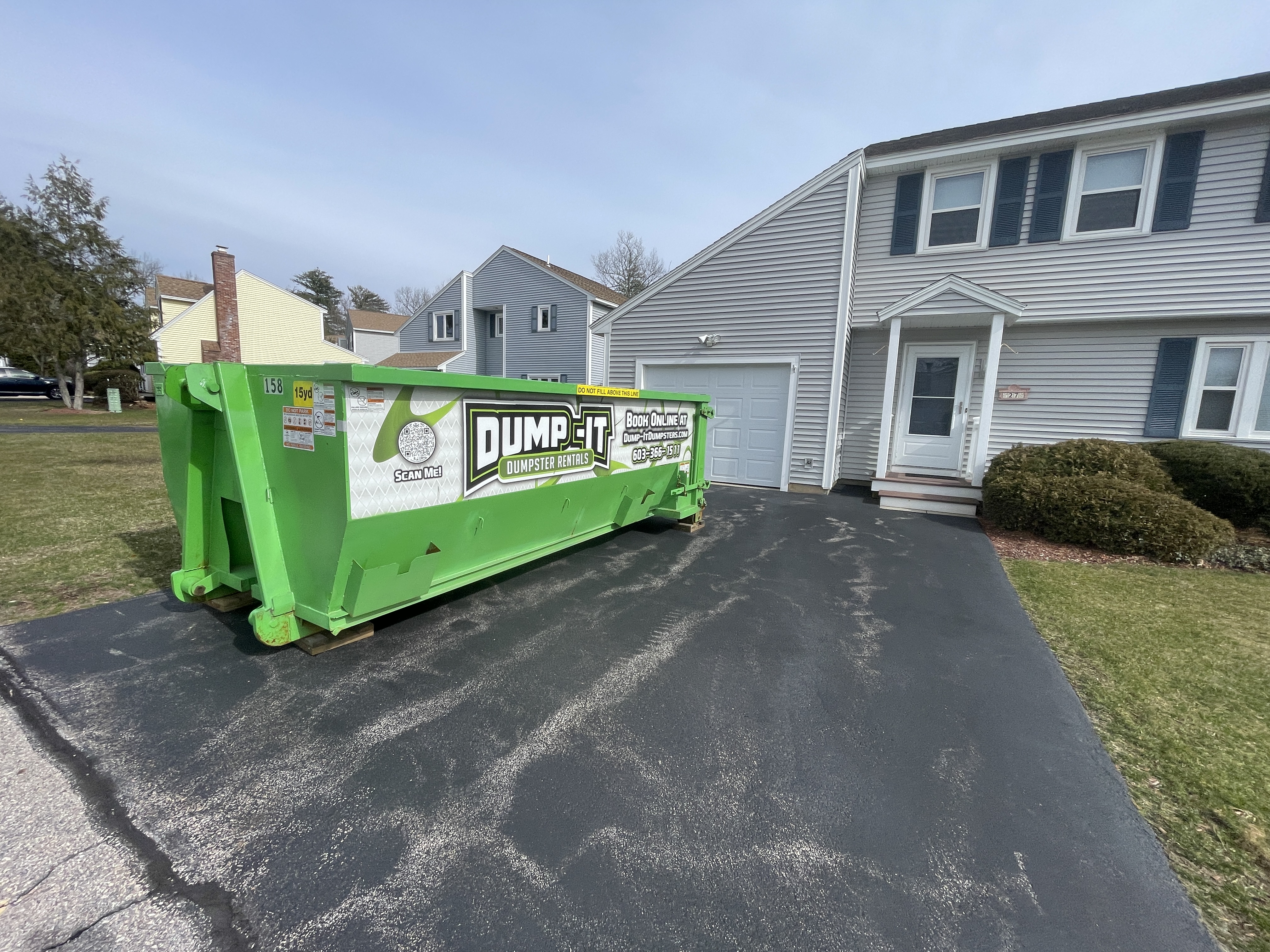 Dumpster from Dump-It Dumpster Rentals at a construction site