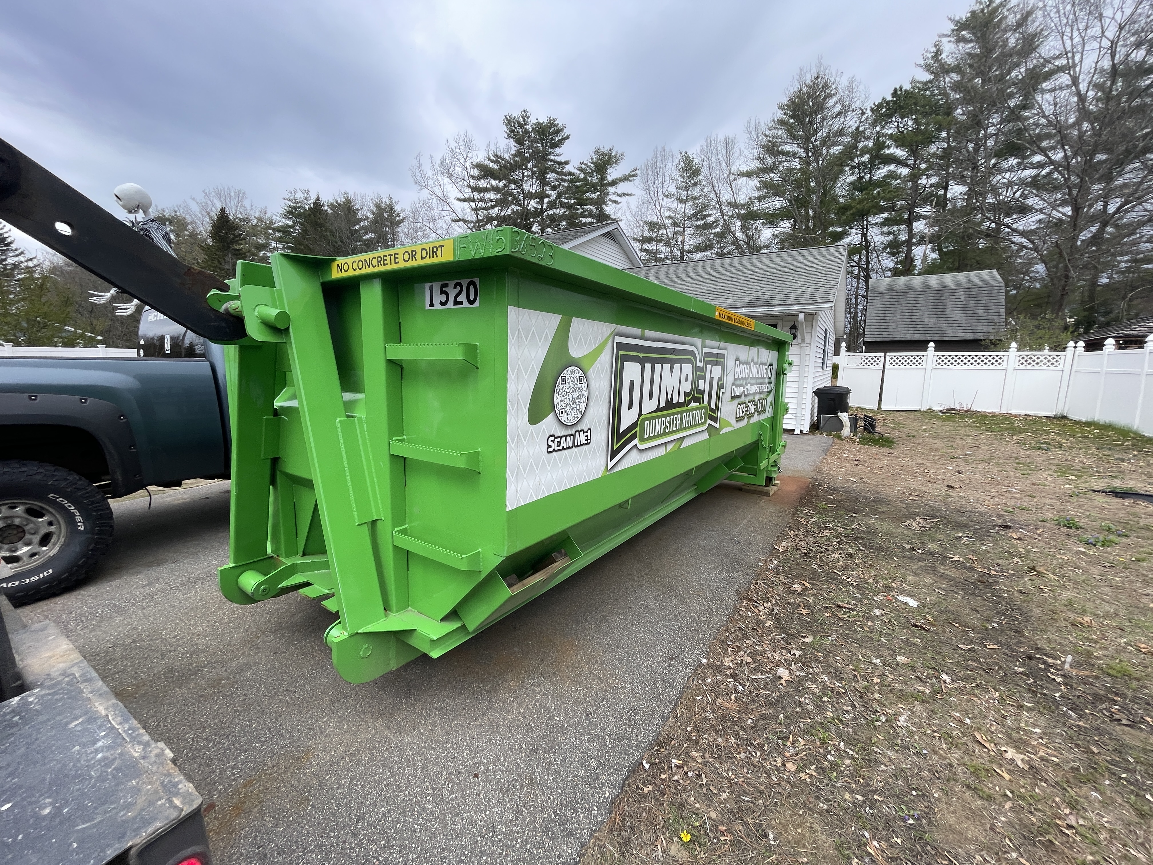 Black dumpster from Dump-It Dumpster Rentals