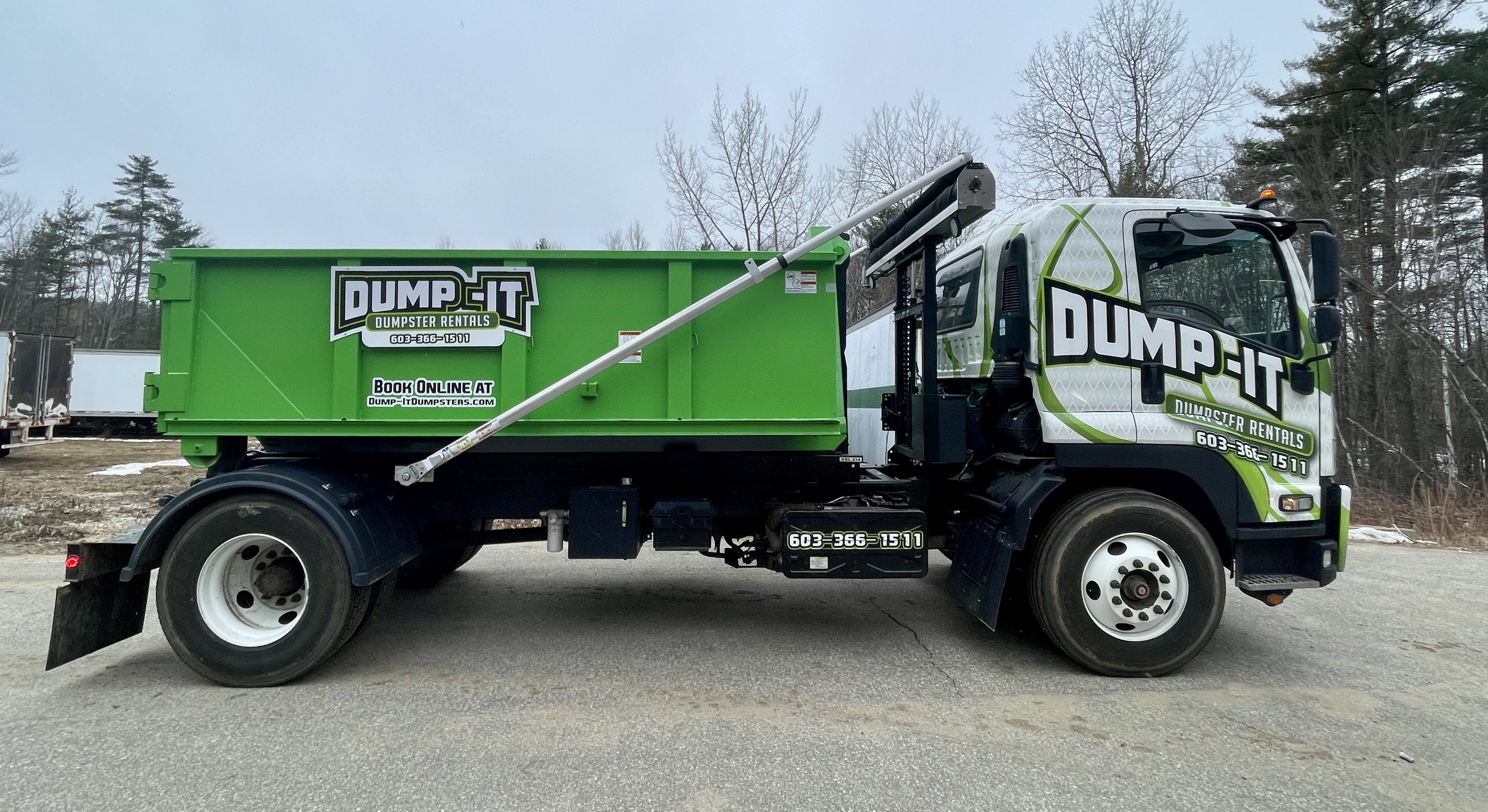 Dumpster from Dump-It Dumpster Rentals positioned on a sidewalk