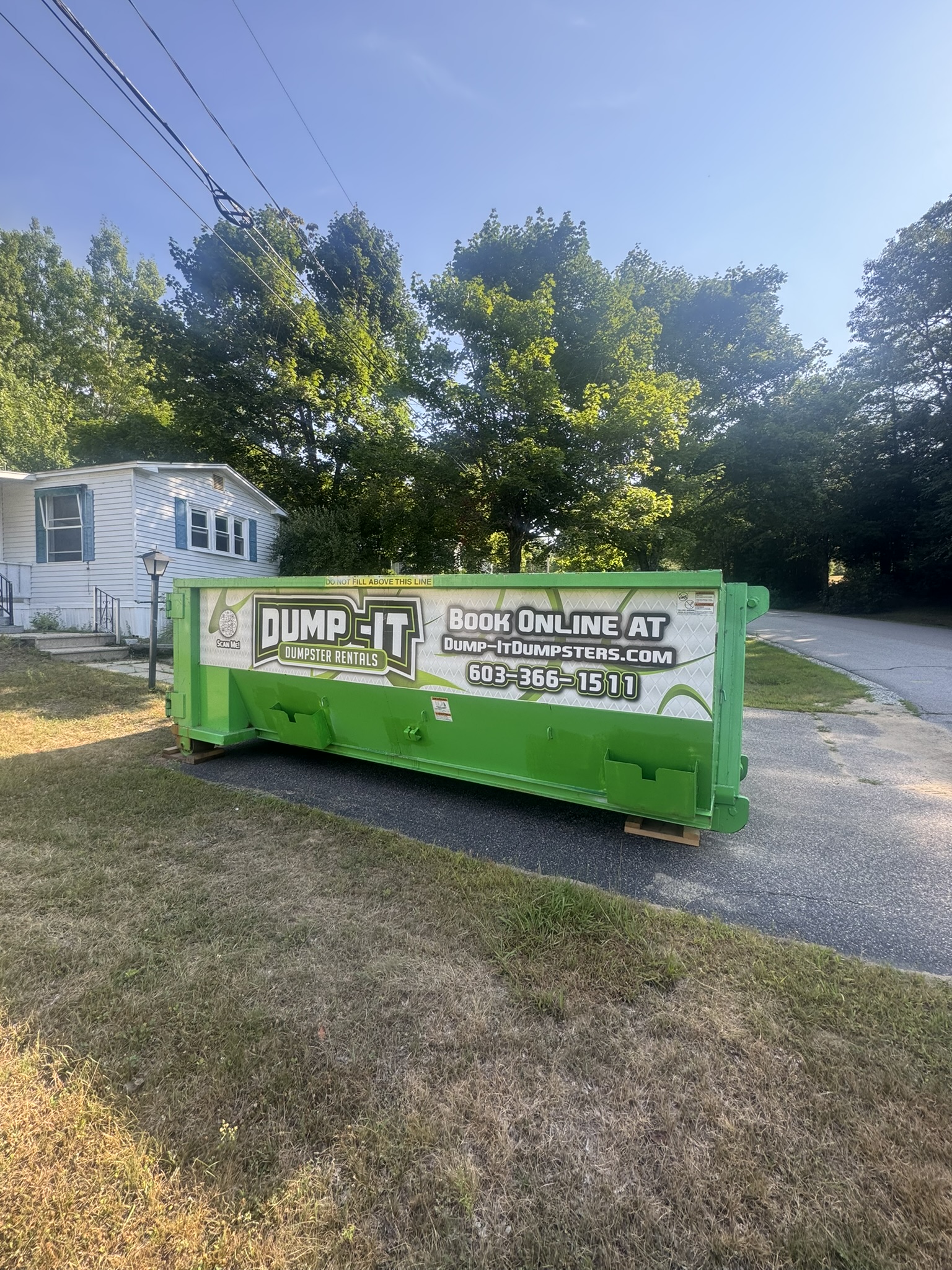 Dumpster from Dump-It Dumpster Rentals at a construction site
