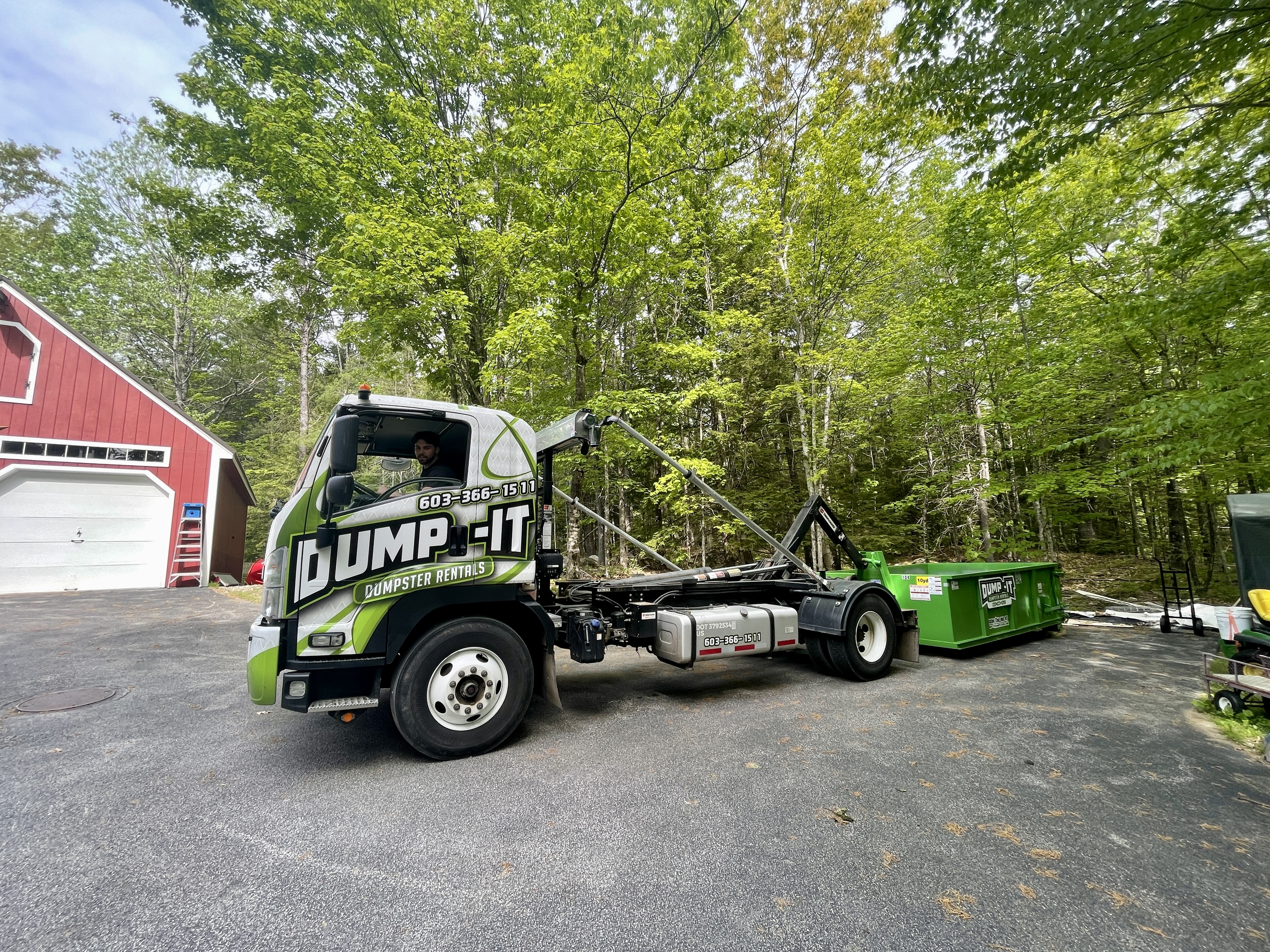 Black dumpster from Dump-It Dumpster Rentals