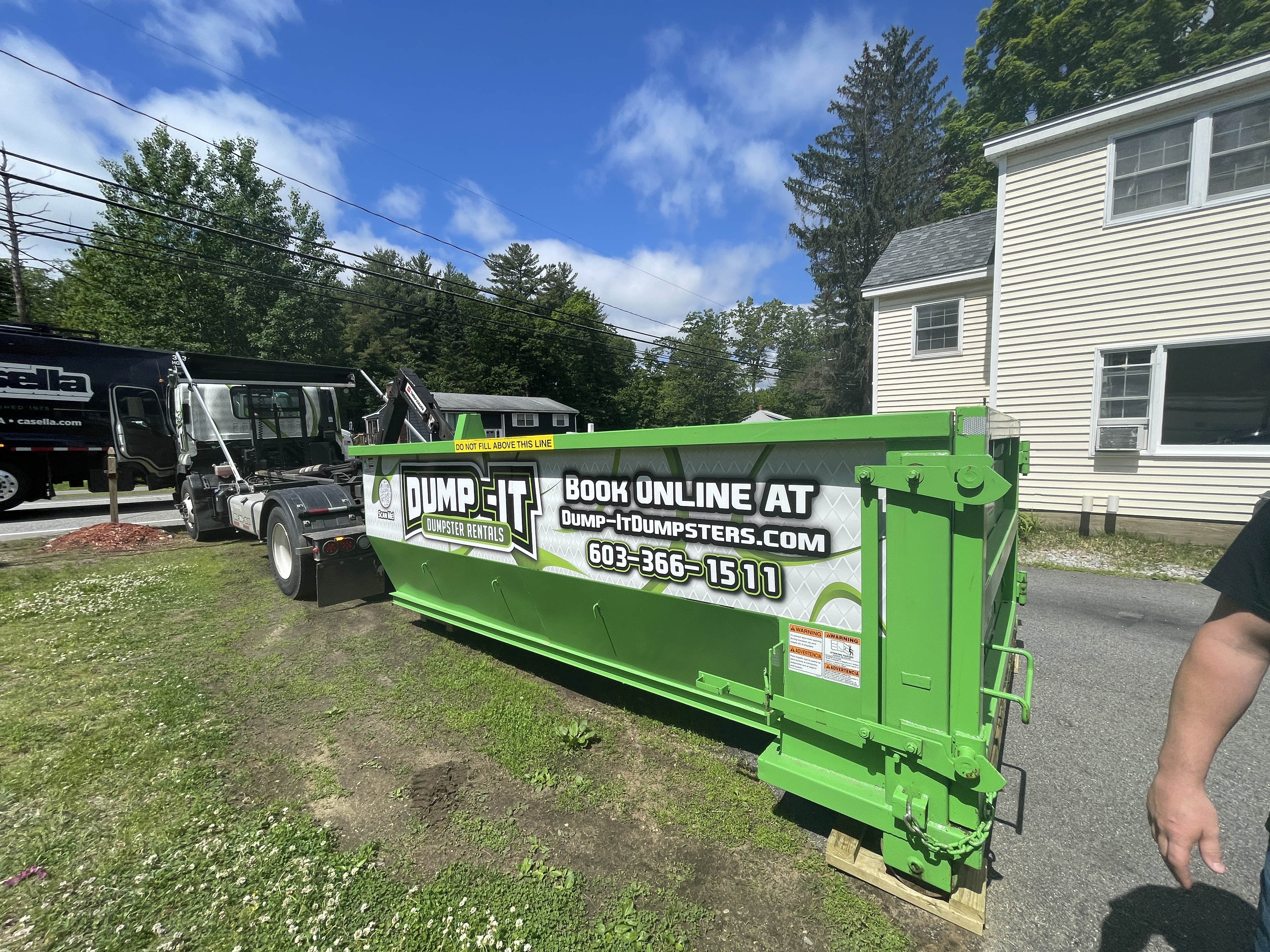 Dumpster from Dump-It Dumpster Rentals at a construction site