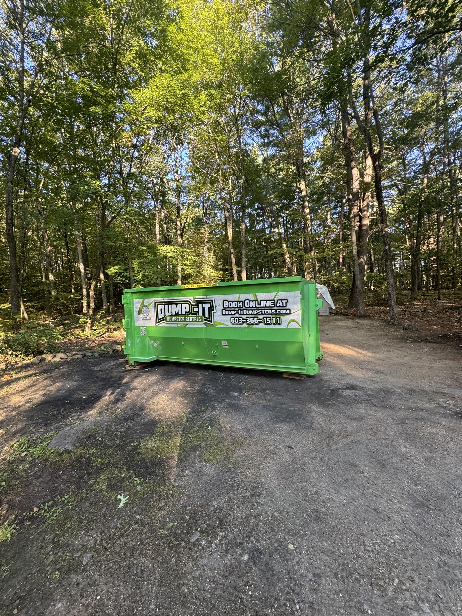 commercial building with a dumpster from dump-it dumpster rentals