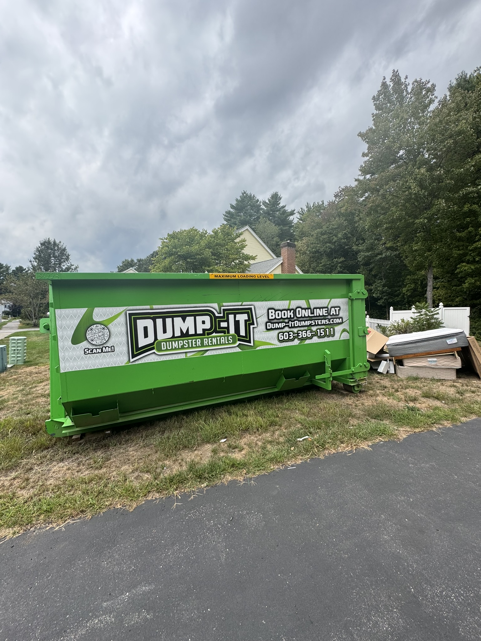 dumpster from dump-it dumpster rentals in a construction site