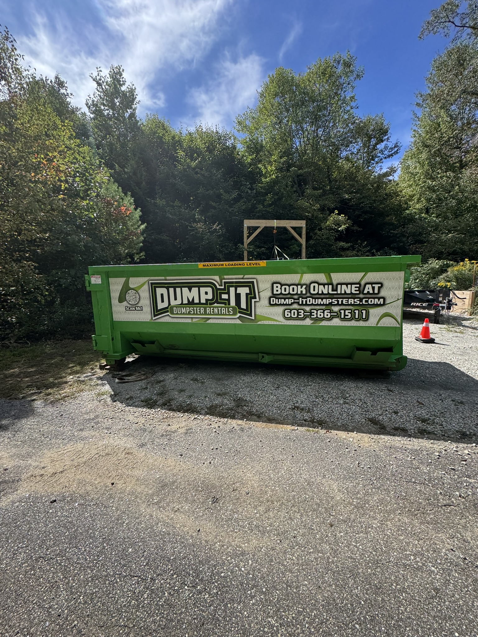 dumpster from dump-it dumpster rentals in a construction site