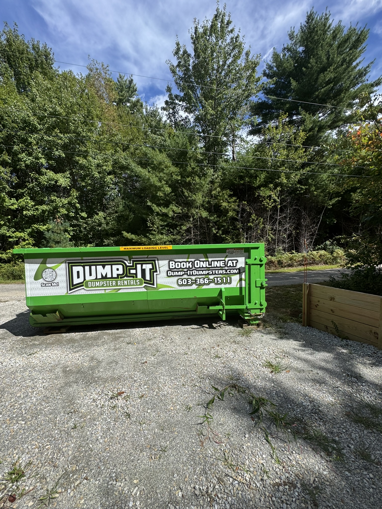 dumpster from dump-it dumpster rentals in a construction site