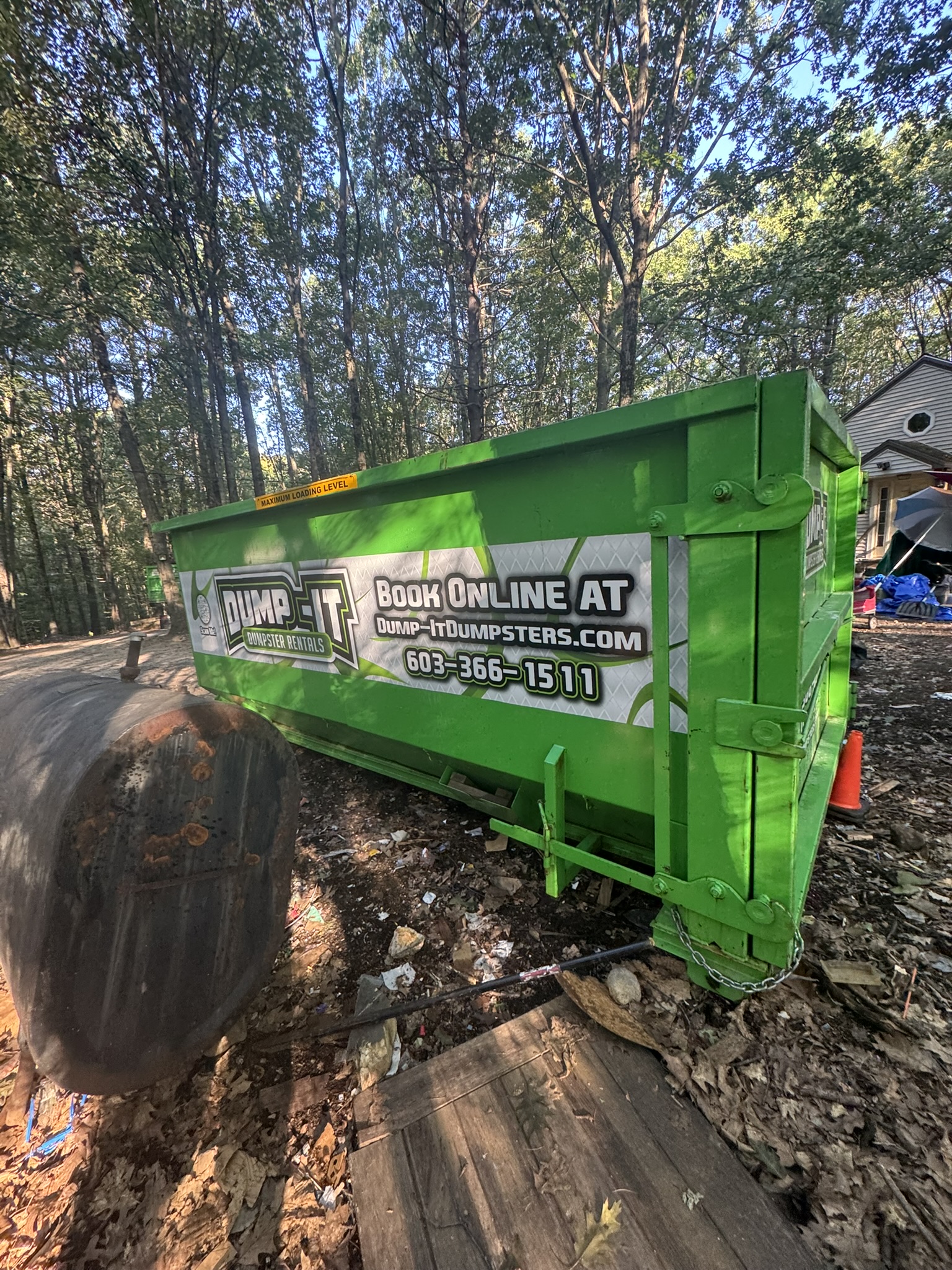 commercial building with a dumpster from dump-it dumpster rentals