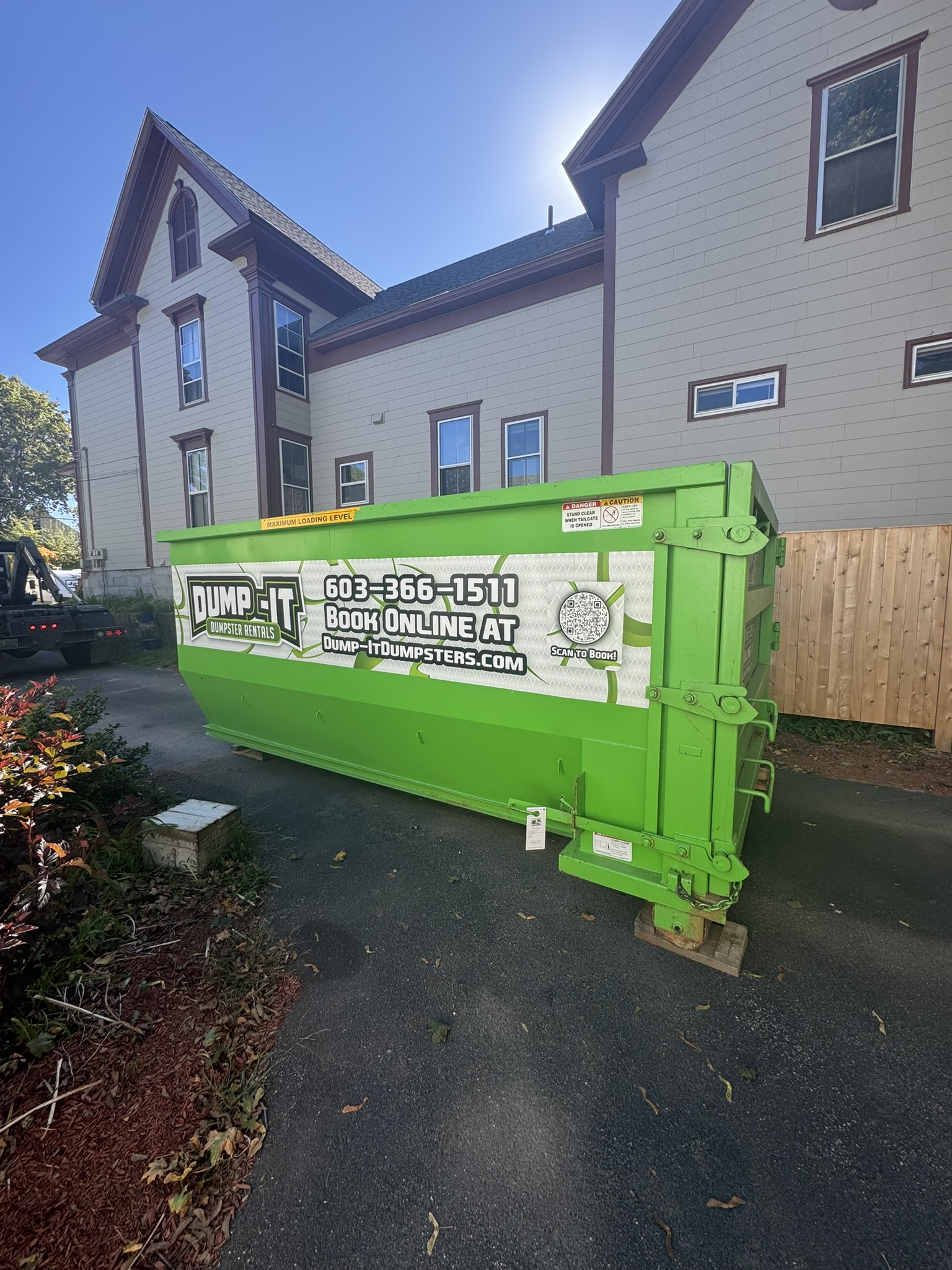 residential house with a dumpster from dump-it dumpster rentals
