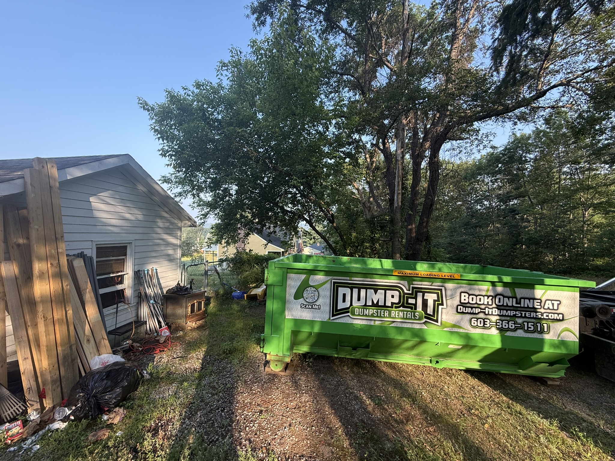 dumpster from dump-it dumpster rentals in a construction site