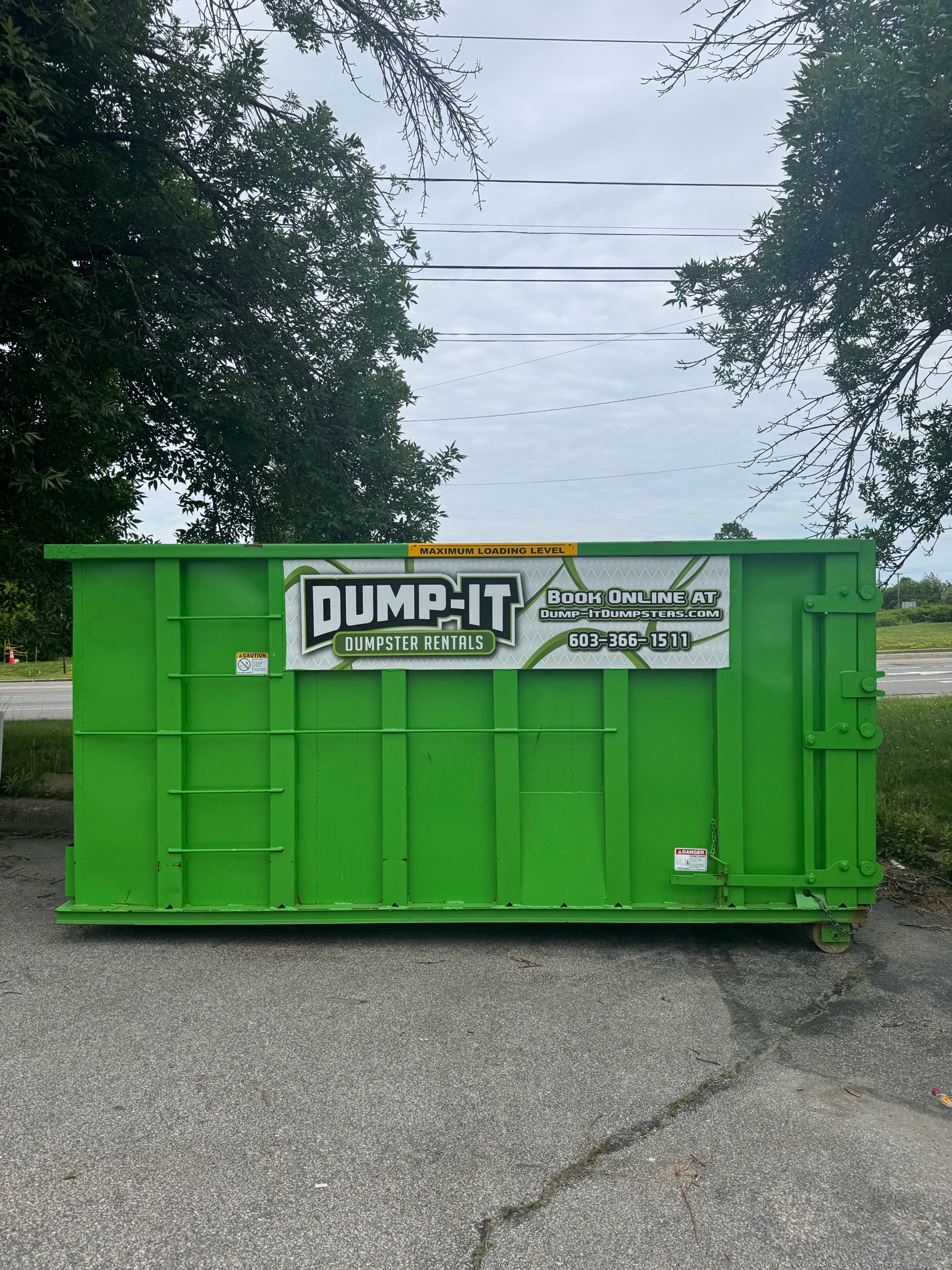 commercial building with a dumpster from dump-it dumpster rentals