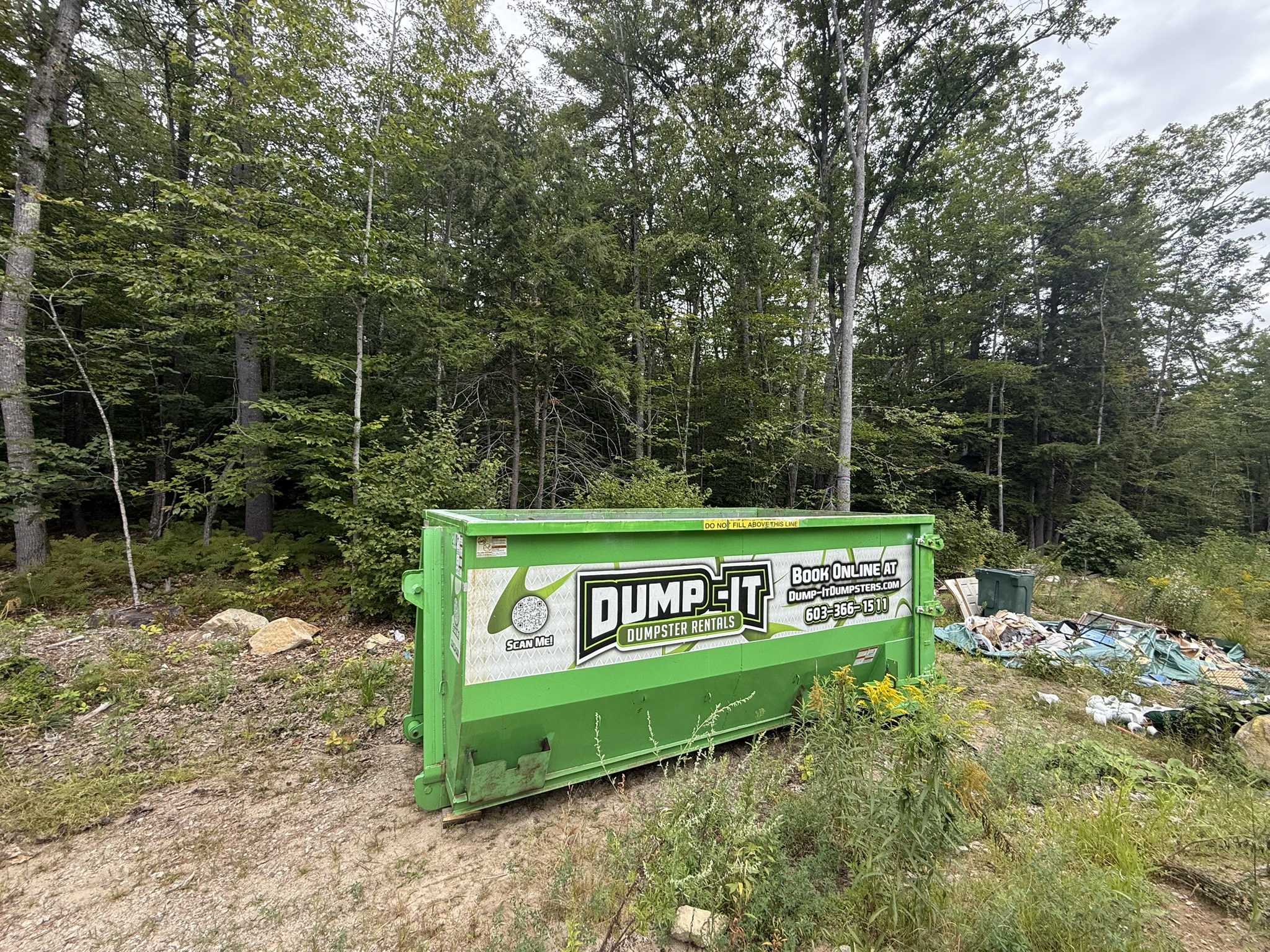 commercial building with a dumpster from dump-it dumpster rentals