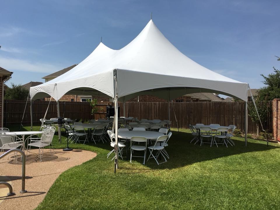 tent tables and chairs for a wedding 