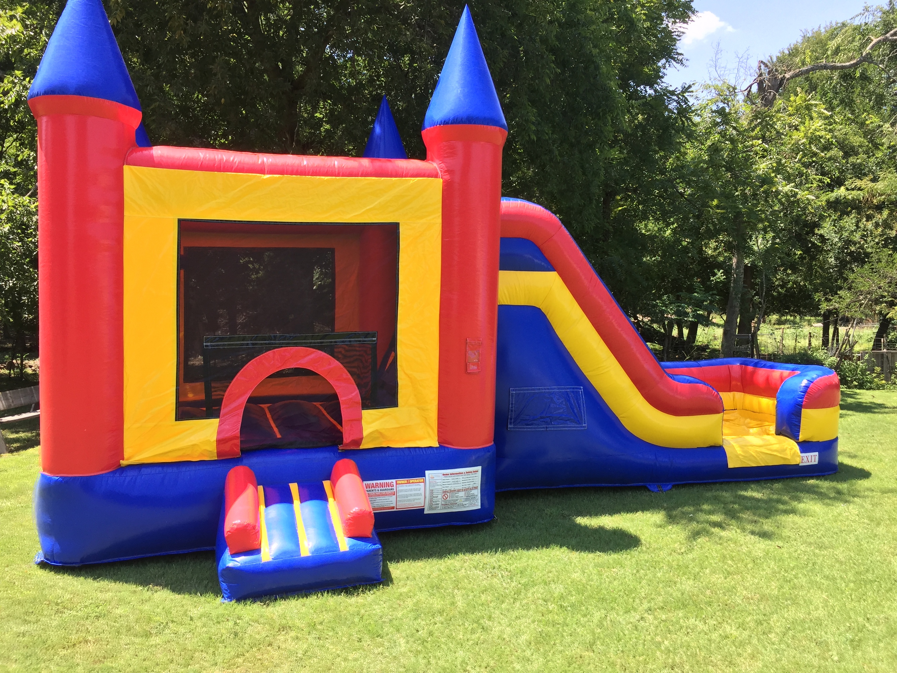 bounce house with a slide