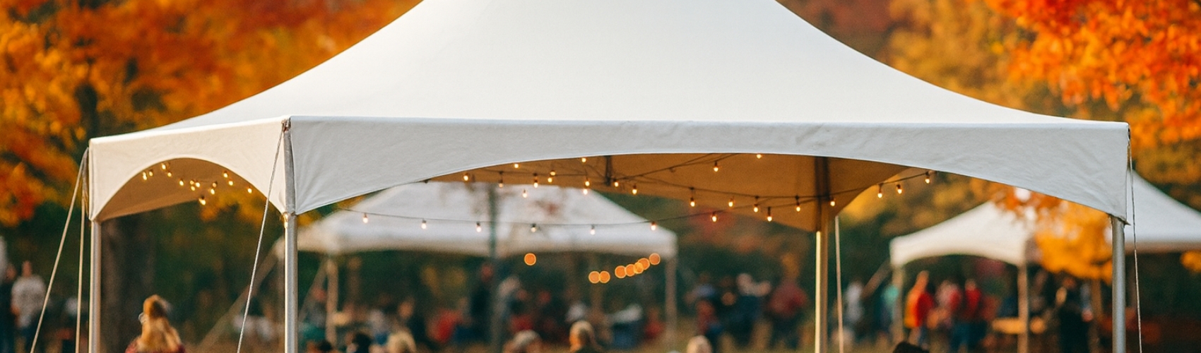 White event tent rental at fall festival