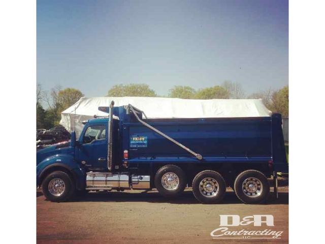 Dumpster rental truck showcasing upfront costs and transparent pricing Dumpster rental truck showcasing upfront costs and transparent pricing
