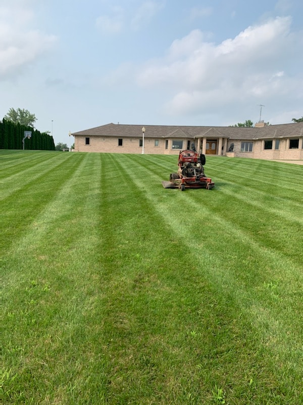 Dawdy Services is lawn care company for Bloomington, Illinois.