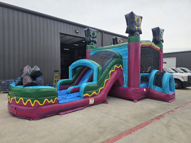 level Up Bounce House with dual slides left side