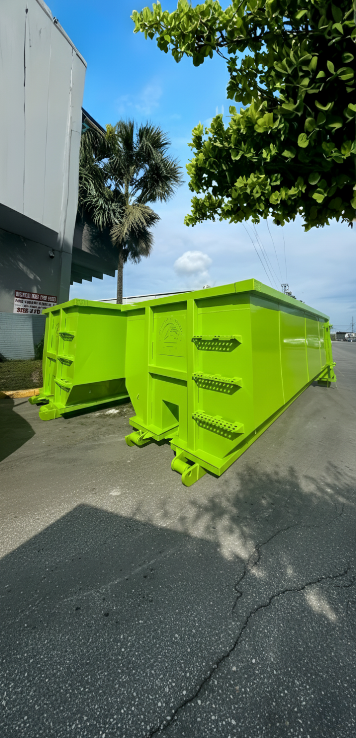 Two large Dumpster Depot lime green roll-off bins in a commercial lot. Two large Dumpster Depot lime green roll-off bins in a commercial lot.