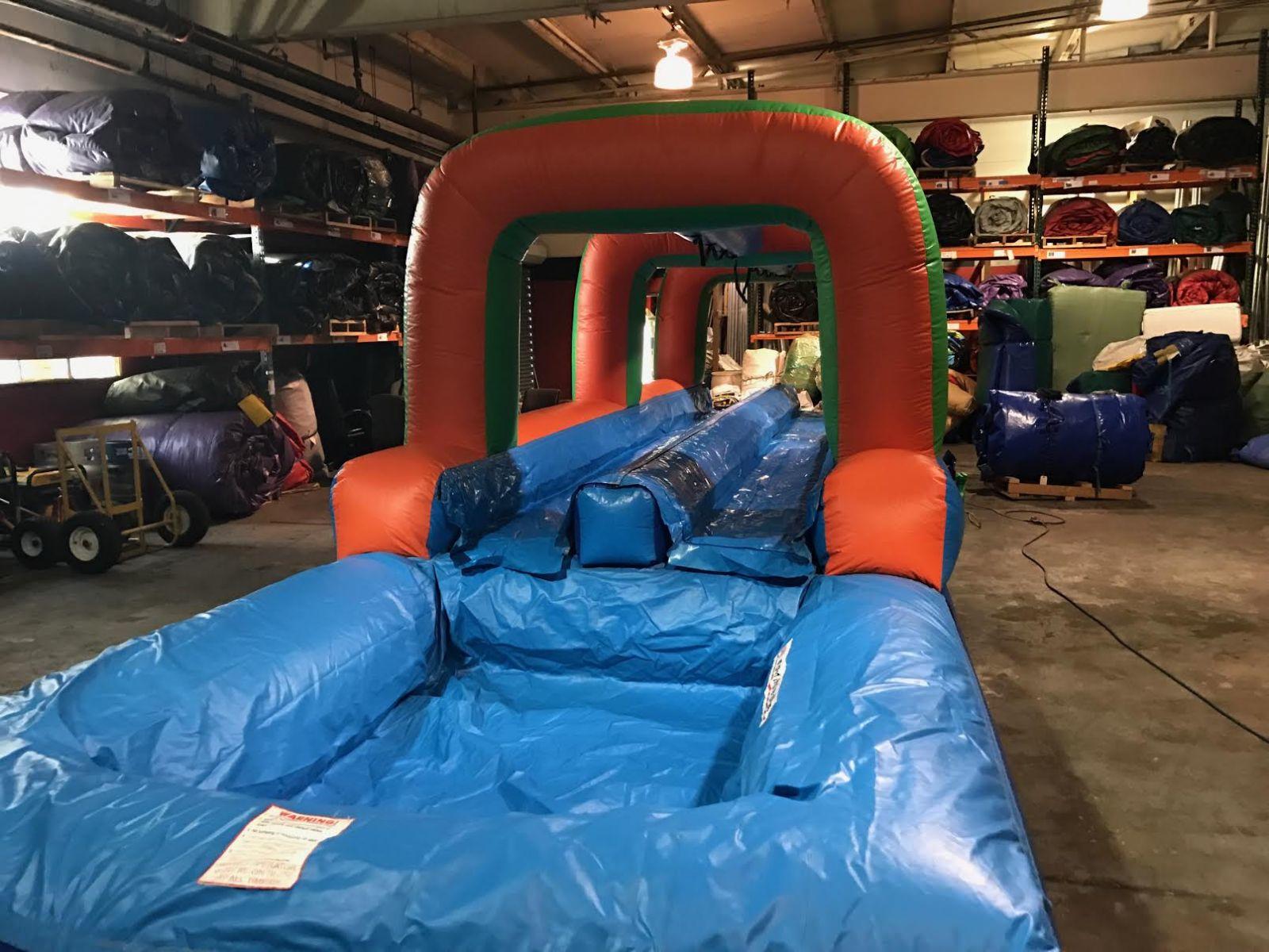 Orange & Green Double Lane Slip N Slide Jump around party rentals