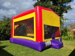 Multi Color Bounce House with Inside Slide and Basketball Hoop 16x21 | Area needed 18'Wx24'Lx16'H