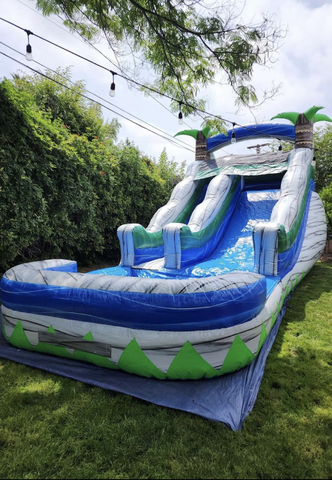 Water slide rental set up at a Menifee backyard party