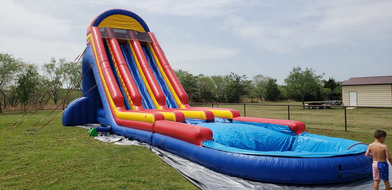Water slide rental for a summer party