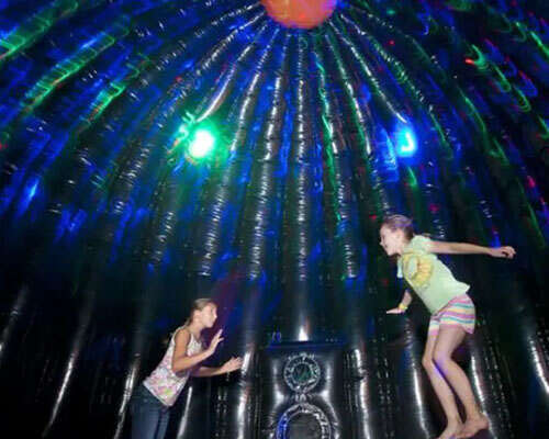 Disco dance party bounce house rental for pre-teen birthday parties