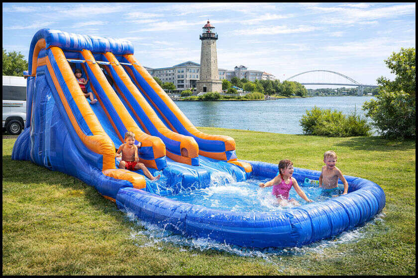 Rockwall water slide rental and inflatable party setup near Lake Ray Hubbard