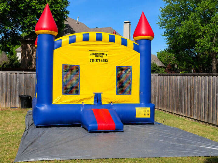 Bright bounce house and slide rental for daycare children