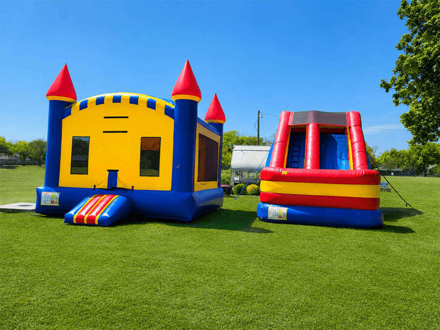 Bounce house and inflatable slide setup for a North Texas community event