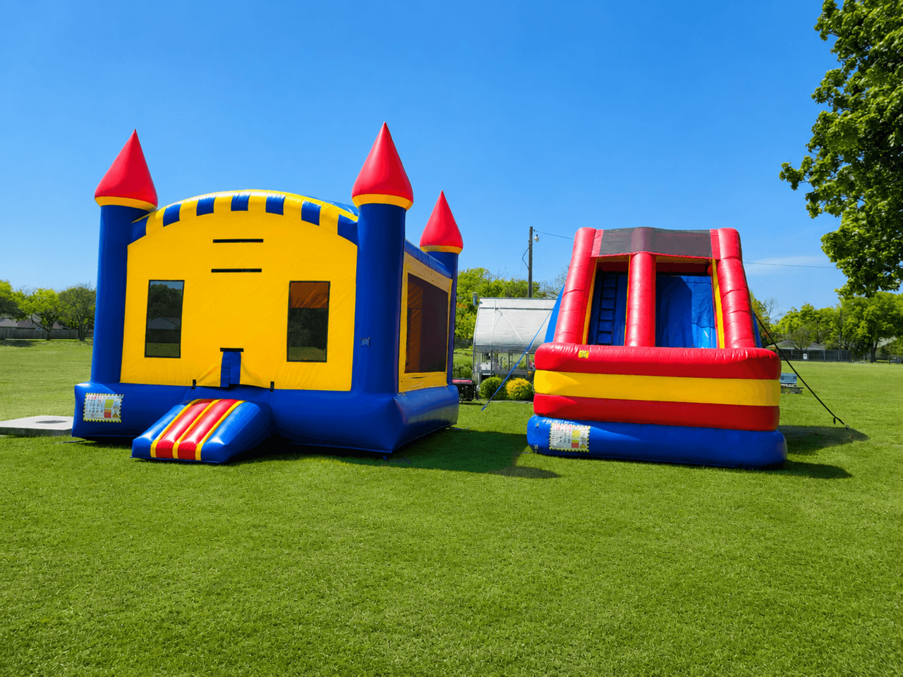 Bounce house and inflatable slide setup for a North Texas community event