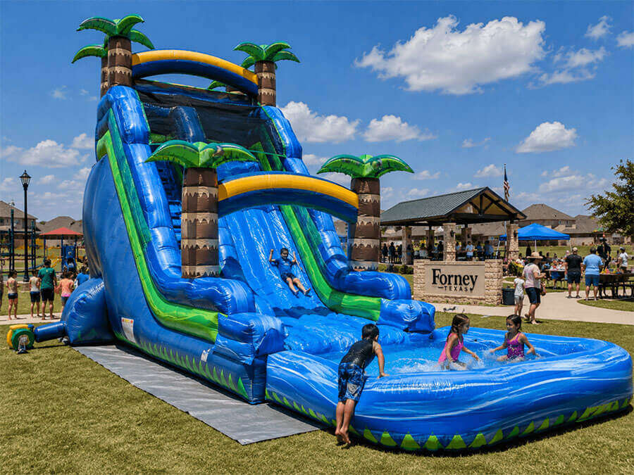 Large water slide rental set up for summer fun