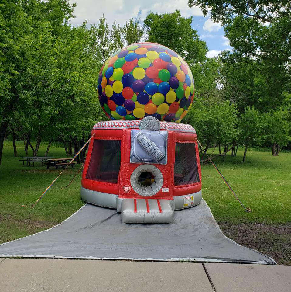 Gumball themed bounce house rental for a kids party