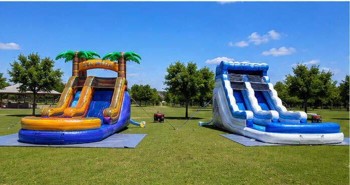 Multiple inflatables lined up across a large public event field