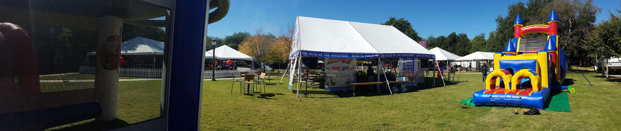 Fun Times Party Rental multi-attraction college football event setup at SMU