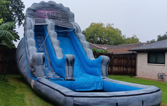 20’ Storm wavy wide lane water slide rental #33