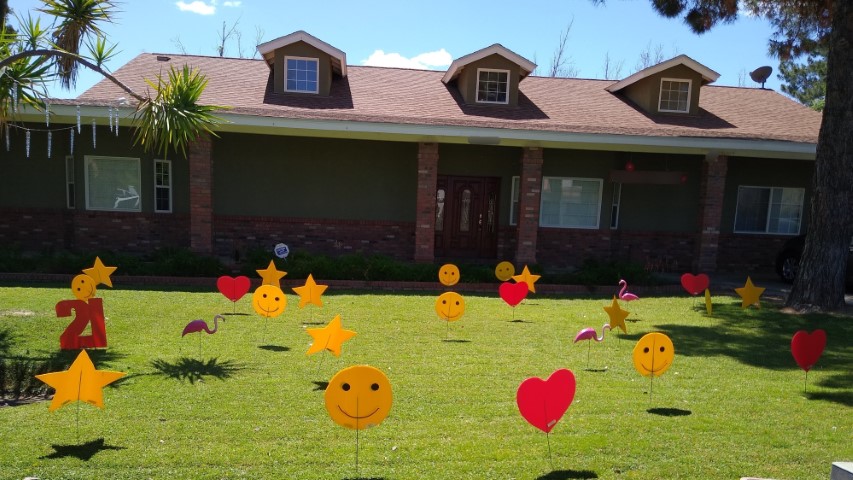 Birthday yard card sign display of big number 21s, hearts, stars and smileys near Mesa AZ