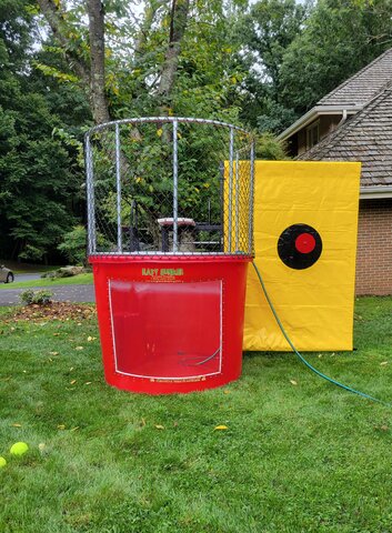 Dunk tank rental from Fiesta Time & Amusements at a backyard party in Montgomery County MD