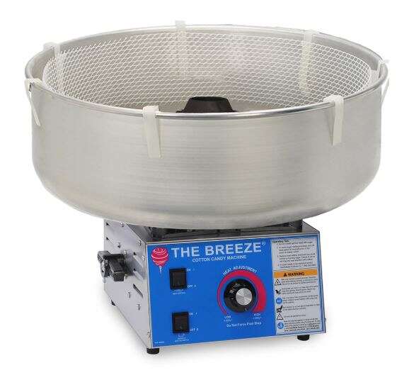 Commercial cotton candy machine with stainless steel bowl, mesh guard, and blue control panel for carnival and concession stand use.