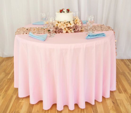 Light pink round table linens 