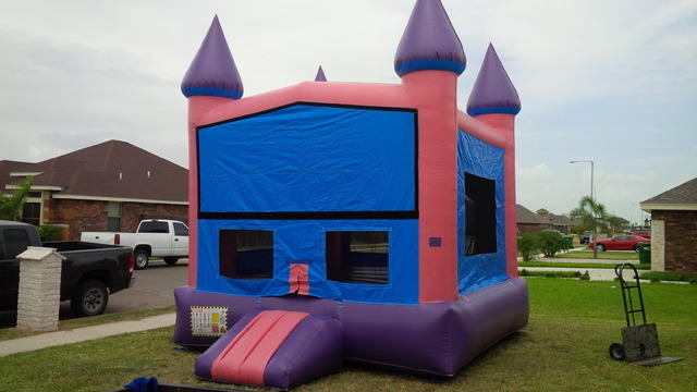 Pink Castle Bounce House with Basketball Hoop