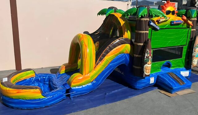 Hawaiian themed combo waterslide 13ft wide 30ft long basketball hoop inside  